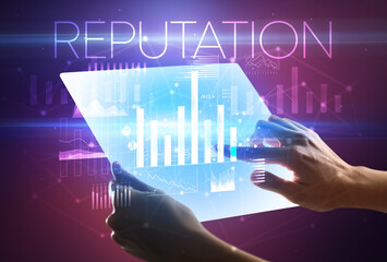 Hand holding futuristic tablet with REPUTATION inscription above, modern business concept