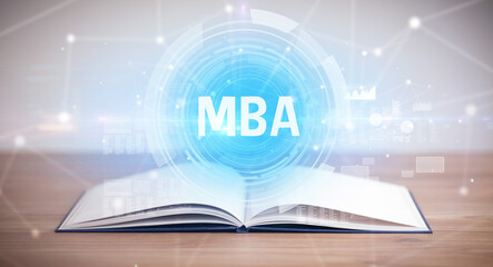 Open book with MBA abbreviation, modern technology concept