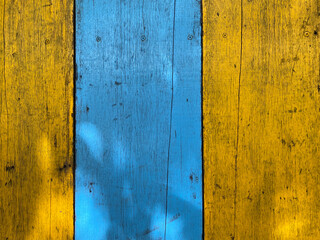 vintage yellow and blue wood background - old blue color wooden plank