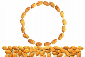 frame of almond nut isolated in white background with copy space