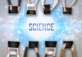 Group of Busy People Working in an Office with SCIENCE inscription, modern technology concept