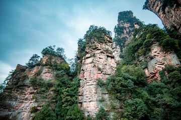 Amazing landscape of mountain and forest in the foggy at Wulingyuan, Hunan, China. Wulingyuan Scenic and Historic Interest Area which was designated a UNESCO World Heritage Site in China