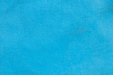 The old blue skin texture has specks.