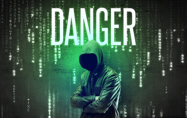 Faceless hacker with DANGER inscription, hacking concept