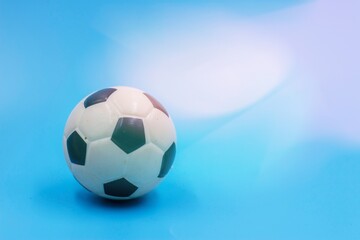 Fototapeta na wymiar Soccer ball is on blue background