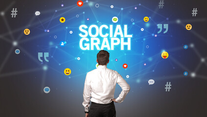 Rear view of a businessman with SOCIAL GRAPH inscription, social networking concept