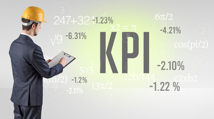 Technology Engineer in hard hat with KPI abbreviation