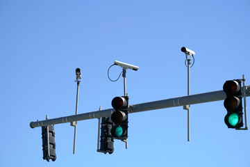 Traffic light and surveillance camera