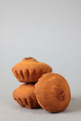 a pile of teacakes isolated on grey background. Minimal concept