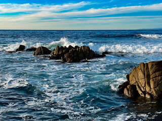 waves crashing on rocks