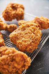 crispy southern style fried chicken in a black stone table