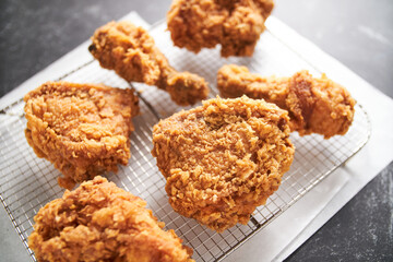 crispy southern style fried chicken in a black stone table