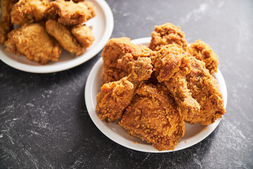 crispy southern style fried chicken in a black stone table