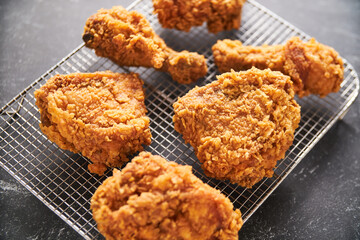 crispy southern style fried chicken in a black stone table