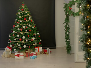 Fototapeta na wymiar Christmas tree with gifts decor for the new year