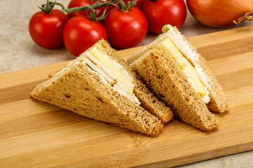 Club sandwich with chicken and cheese
