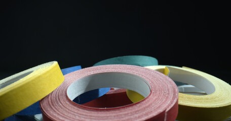A mountain of paper skeins. Rolls of Multicolored paper. Abstract shot. 