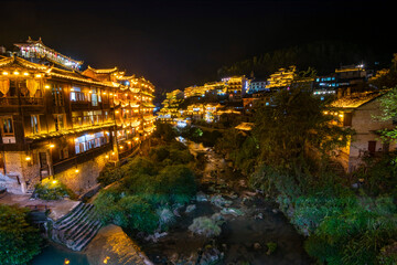  Furong Ancient Town illuminated at night. Amazing beautiful landscape scene of Furong Ancient Town (Furong Zhen, Hibiscus Town), China