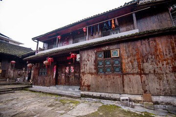 Fototapeta na wymiar Street view local visitor and tourist in Furong Ancient Town (Furong Zhen, Hibiscus Town), China. Furong Ancient Town is famous tourism attraction place.