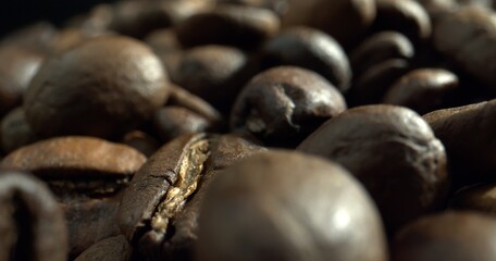 Macro shot of dark roasted coffee beans. Coffee beans close-up. 