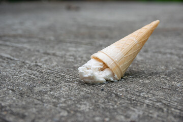 Ice cream falls on the floor