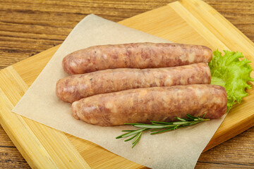 Raw pork meat sausages for grill