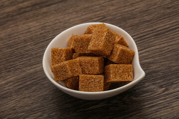 Cane sugar cubs in the bowl