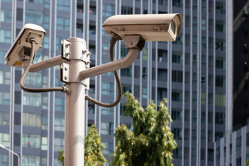 outdoor cctv camera with resident tower background.