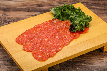 Italian spycy pepperoni sausage slices