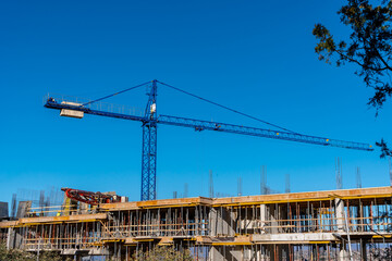 Building that is being built, concrete and sticking fittings