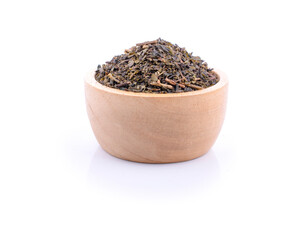 Dried green tea on white background.
