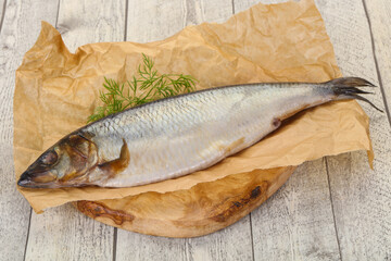 Salted herring over the wooden board