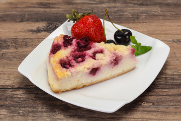 Cheesecake with cherry served strawberry