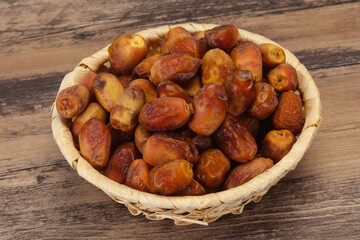 Sweet tasty dry dates in the basket