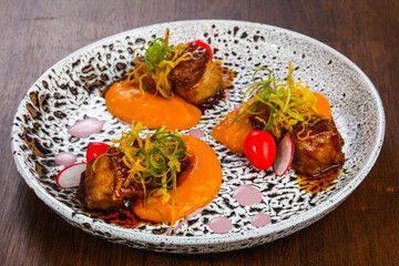 Baked pork with carrot sauce