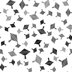 Black Whirligig toy icon isolated seamless pattern on white background. Vector.
