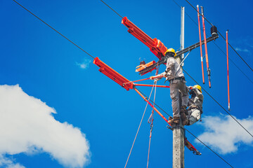 The lineman used tie stick to carve the tie wire used to wrap the electrical wires attached to the damaged high voltage insulator. In order to prepare to replace the damaged equipment