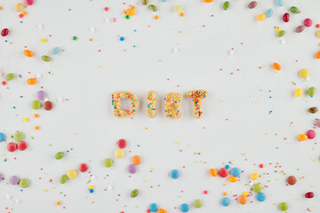 Word diet made of sprinkled sweet sugar cookies, view from the top