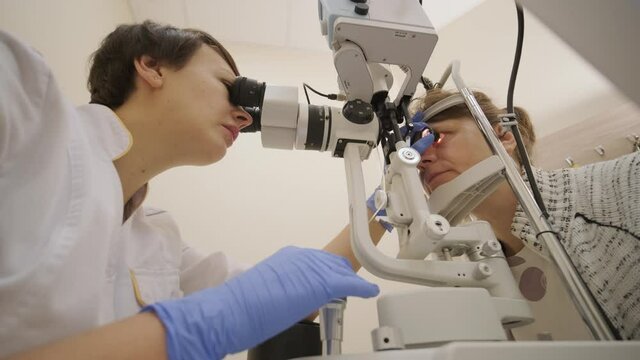 Selective Laser Trabeculoplasty.  General diagnosis of eye diseases. Ophthalmology gonioscopy lens