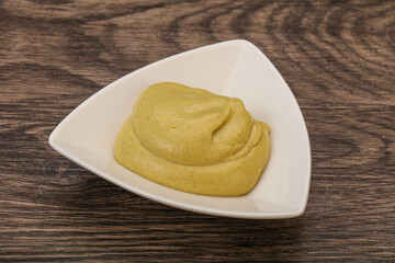 Dijon mustard sauce in the bowl