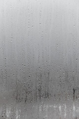 Dripping Condensation, Water Drops Background Rain drop Condensation Texture. Close up for misted glass with droplets of water draining down