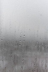 Dripping Condensation, Water Drops Background Rain drop Condensation Texture. Close up for misted glass with droplets of water draining down