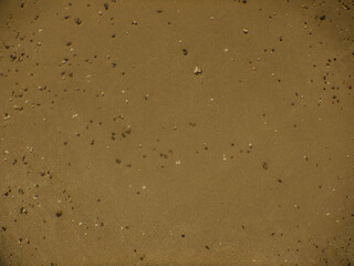 soft sand and many little stones in the sun
