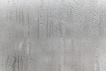Dripping Condensation, Water Drops Background Rain drop Condensation Texture. Close up for misted glass with droplets of water draining down
