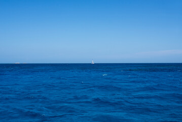a very beautiful calm blue sea in the mediterranean between france and italy for peaceful, calm and zen vacations