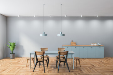 Grey and wooden dining room with wooden minimalist furniture on parquet