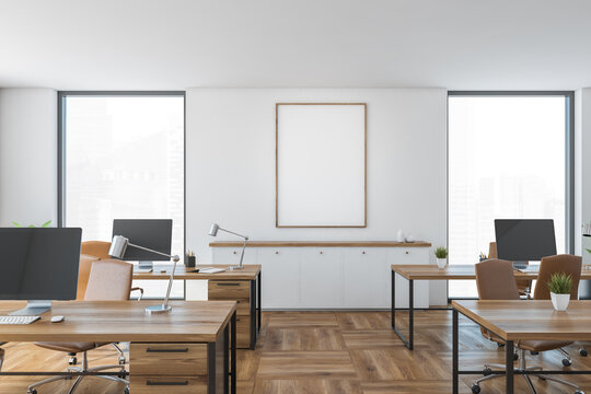 Mockup canvas in office room with chairs and computers on table, wooden design