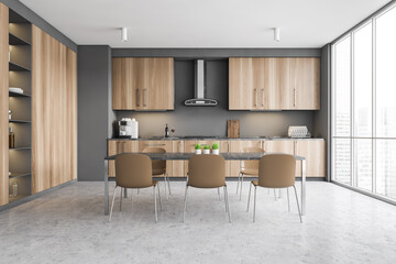 Modern gray kitchen with table, front view