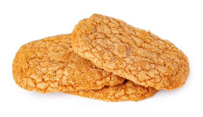 Heap of oat cookies isolated on white background