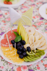 fruit plate, sliced fruit, table setting